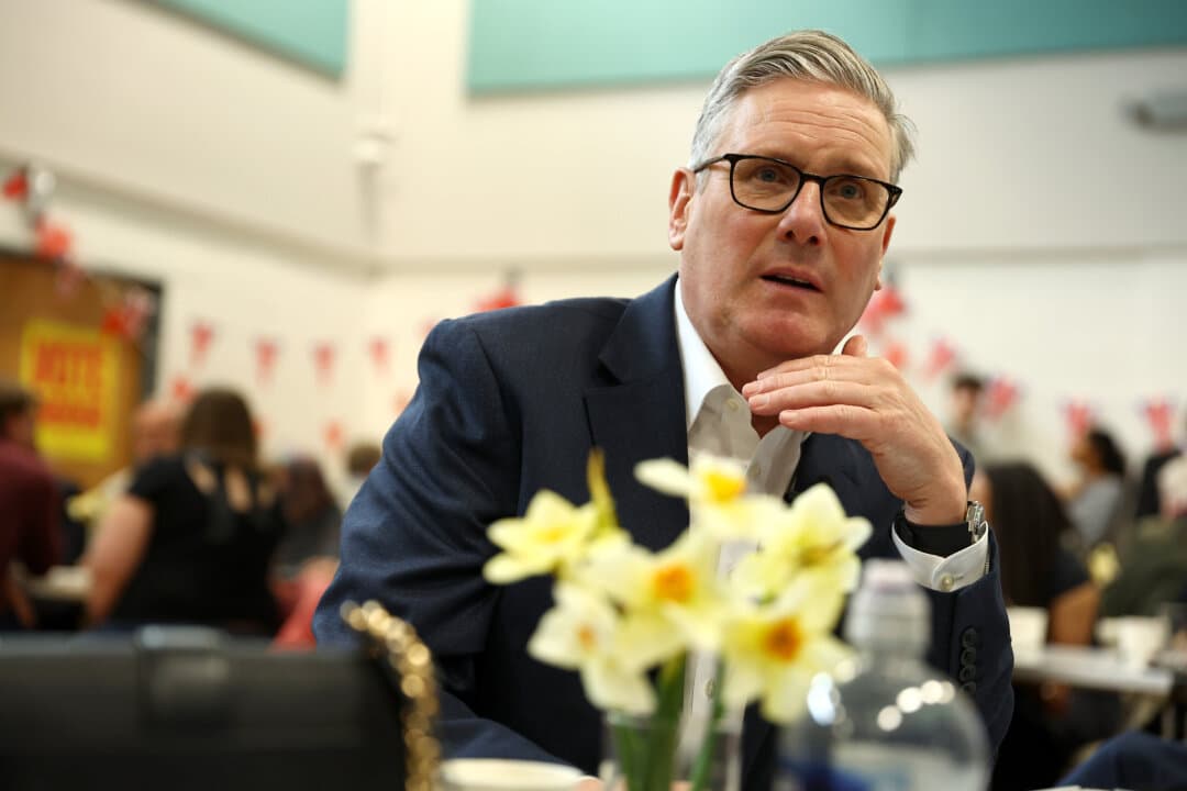 Prime Minister Keir Starmer speaks with residents at Newton Leys pavilion in Milton Keynes, England, on April 1, 2026. (Peter Nicholls/Getty Images)