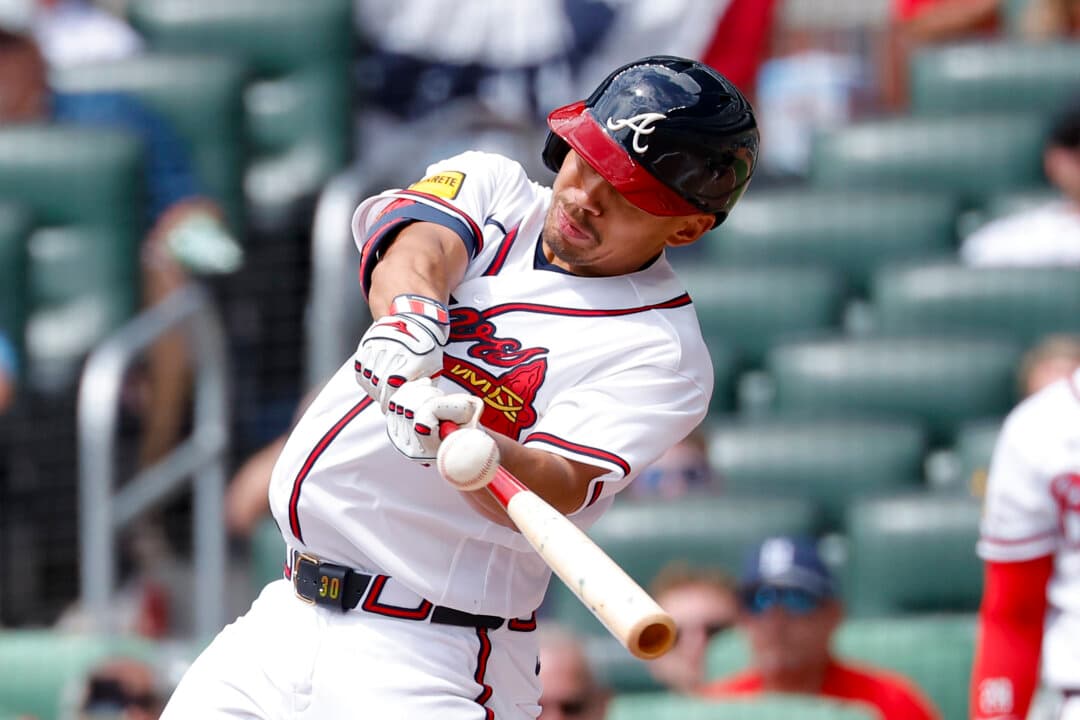 Drake Baldwin of the Atlanta Braves hits a two-run single during the second inning against the Athletics at Truist Park in Atlanta on April 1, 2026. (Todd Kirkland/Getty Images)