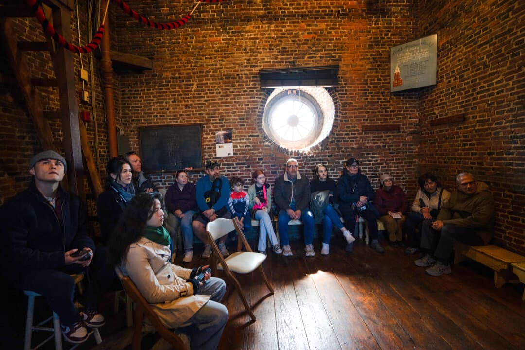 Visitors tour the bell ringing chamber in Old North Church in Boston on April 8, 2026. (Samira Bouaou/The Epoch Times)