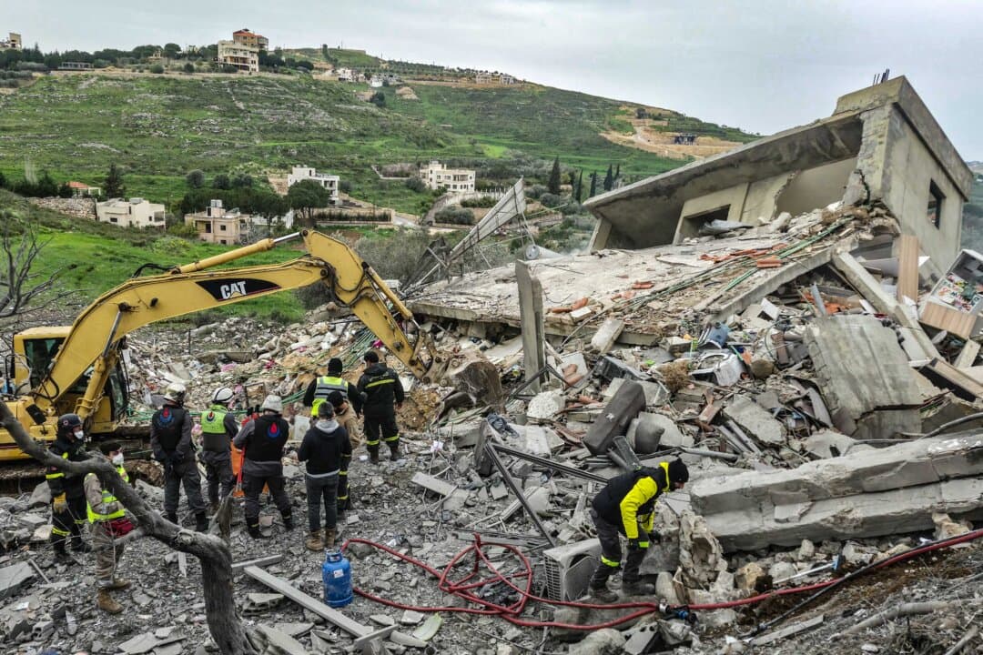 First responders search for survivors at the site of an overnight Israeli airstrike that targeted a house in the southern Lebanon village of Zibdine, on April 2, 2026. (Abbas Fakih/AFP via Getty Images)