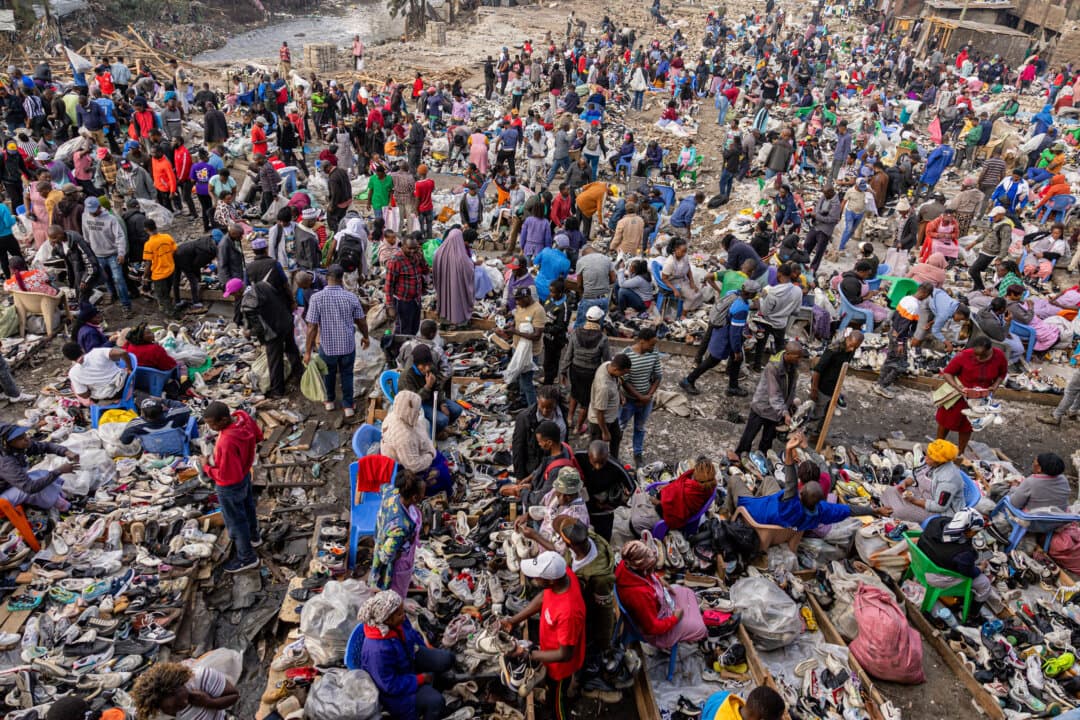 Vendors display second-hand shoes at popular Gikomba's open-air market shoe section, after it was demolished by county authorities following the lapse of an eviction notice, in Nairobi on April 2, 2026. The demolition is in line with efforts to reclaim riparian lands, creating controversy at a national level. (Simon Maina/AFP via Getty Images)