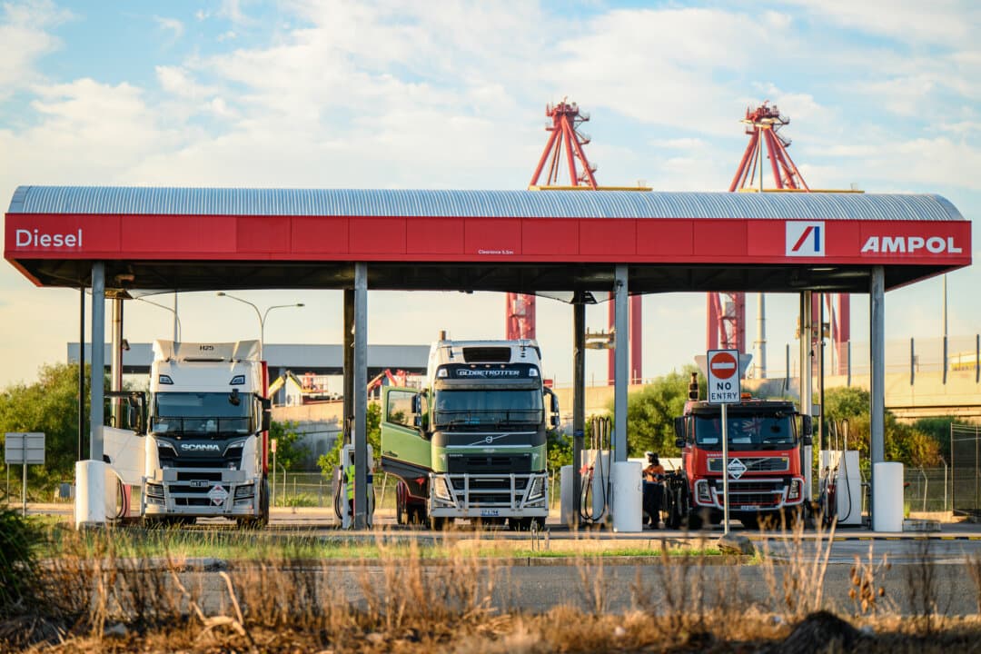 Drivers refuel trucks with diesel fuel at Ampol gas station in Port Botany in Sydney on April 2, 2026. Australian Prime Minister Anthony Albanese urged citizens to back the temporary reduction in fuel excise and a cut to truck road use charges, saying both measures would deliver immediate relief at the pump and in freight costs. (George Chan/Getty Images)