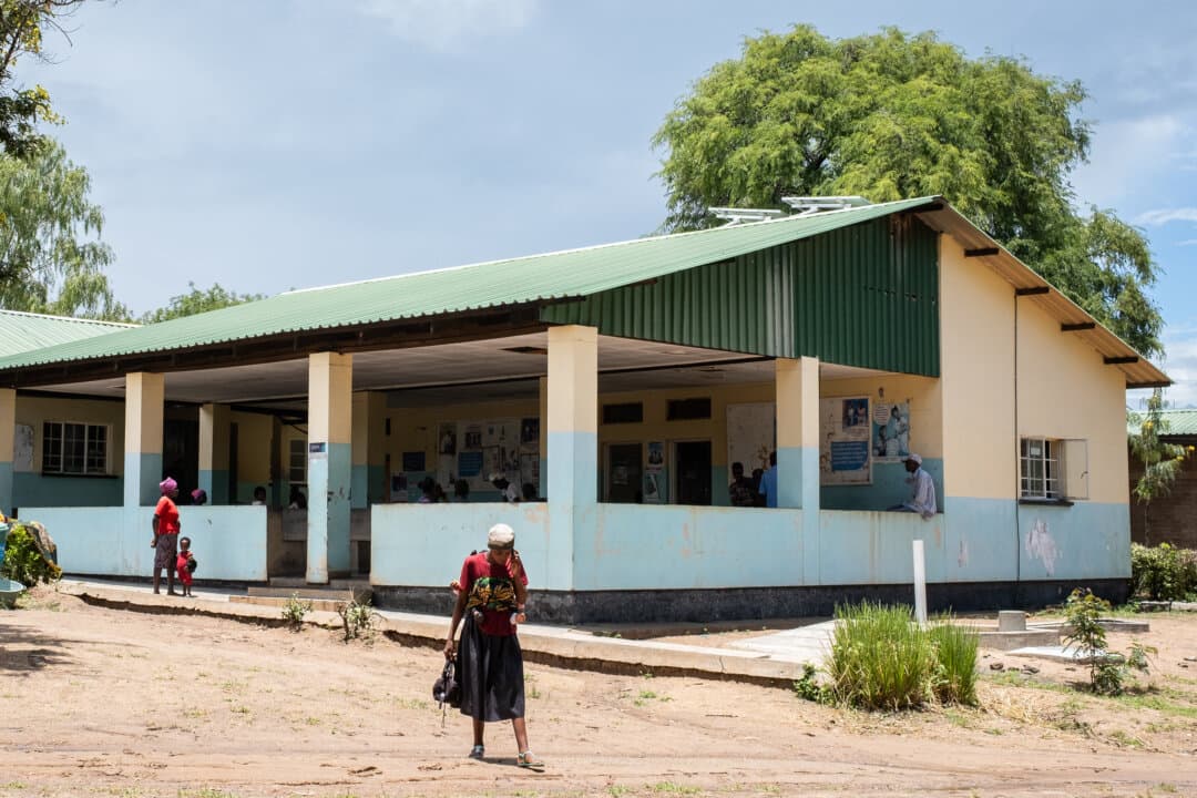 People leave a rural hospital outside of Monkey Bay, Malawi, on Feb. 18, 2026. (John Fredricks/The Epoch Times)