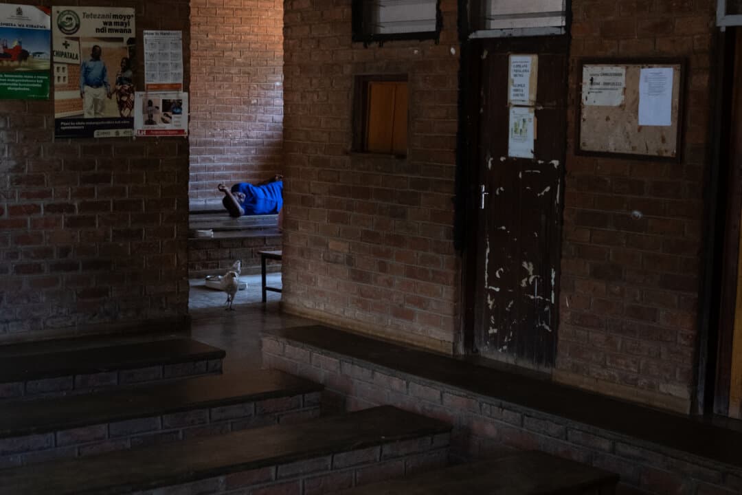 Sick patients await treatment at a rural clinic in the Mangochi District of Malawi on Feb. 19, 2026. (John Fredricks/The Epoch Times)
