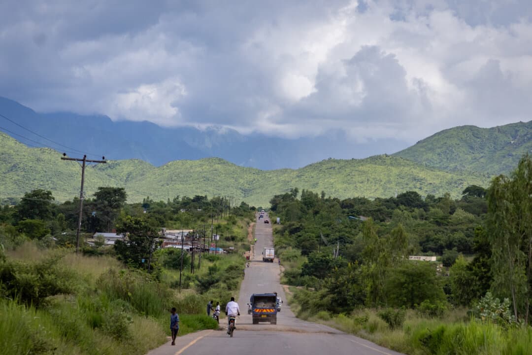People use a road in the Machinga District of Malawi on Feb. 21, 2026. (John Fredricks/The Epoch Times)