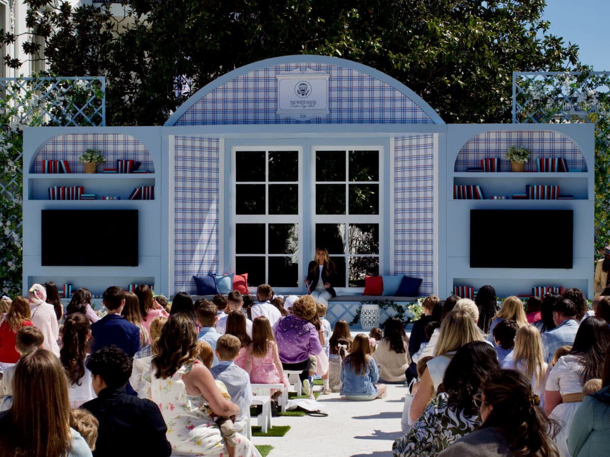 First Lady Melania Trump reads "The Runaway Bunny" to children during the annual White House Easter Egg Roll in Washington on April 6, 2026. (Travis Gillmore/The Epoch Times)
