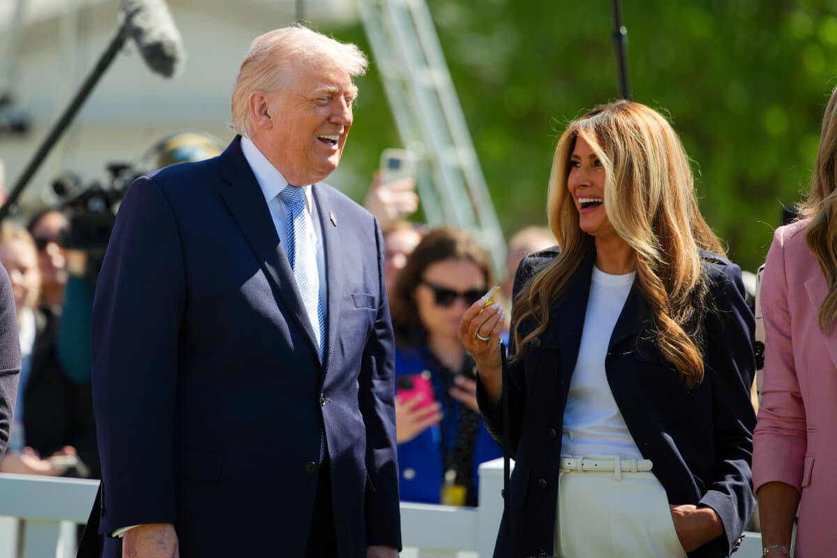 President Donald Trump (L) and First Lady Melania Trump watch the start of an Egg Roll race at the White House Easter Egg Roll on April 6, 2026. (Andrew Harnik/Getty Images)
