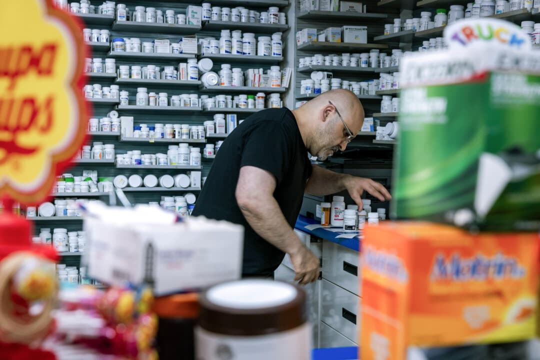 A pharmacist works at NYC Discount Pharmacy in New York on July 23, 2024. Some lawmakers are seeking to reform the 340B Drug Pricing Program, which allows certain safety-net providers to purchase prescription medications at a discount, saying it has increased costs and lacks sufficient oversight. (Spencer Platt/Getty Images)