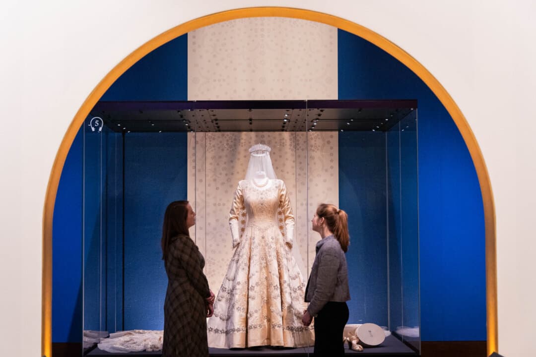 Queen Elizabeth II's wedding dress, veil, and train, worn for her marriage to Prince Philip at Westminster Abbey on Nov. 20, 1947, go on view during an exhibition in The King's Gallery at Buckingham Palace in London on April 9, 2026. (Tristan Fewings/Getty Images)