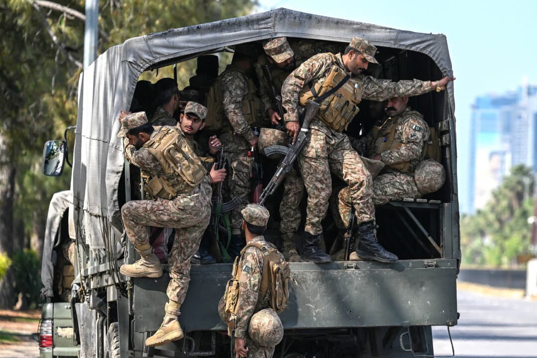 Pakistani army soldiers arrive for deployment in the Red Zone area of Islamabad, Pakistan, on April 10, 2026. Iranian and U.S. envoys are preparing to hold talks in Islamabad to end the Middle East war, with Beijing playing a behind-the -scenes role in facilitating negotiations, officials and experts say. (Aamir Qureshi/AFP via Getty Images)