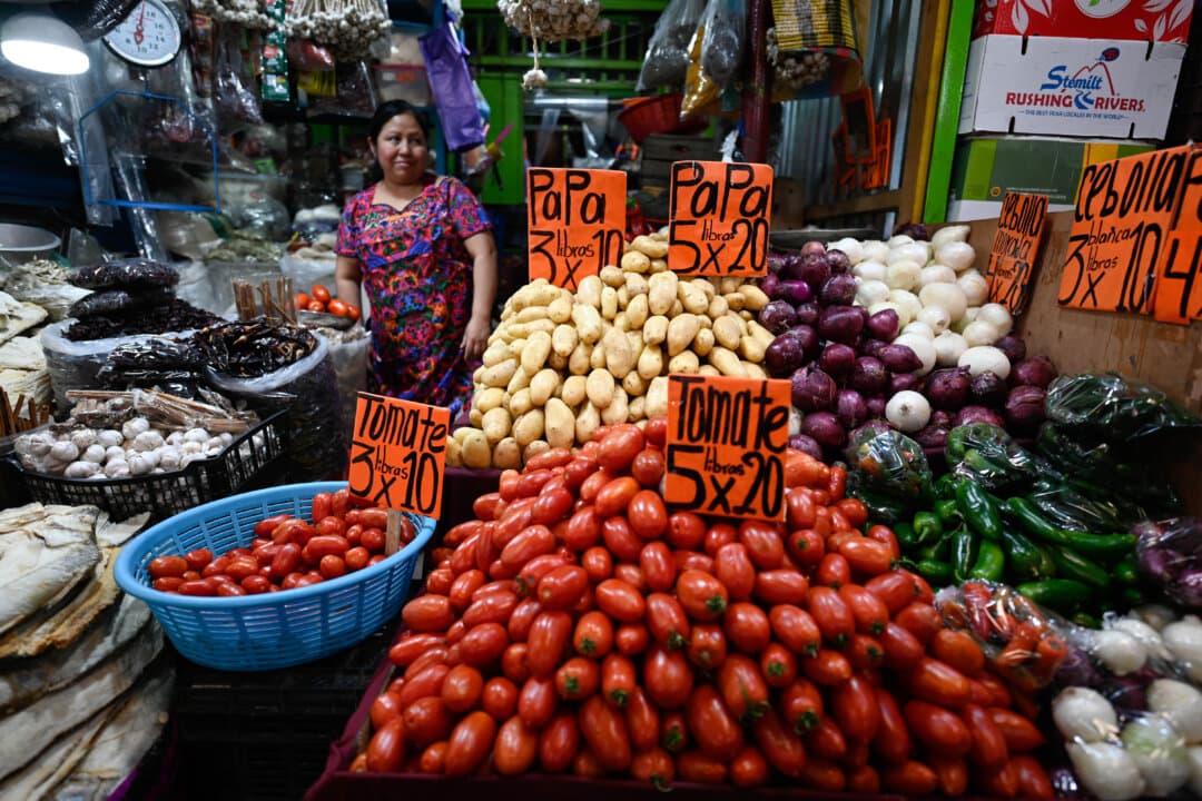 A woman waits for customers at La Terminal market in Guatemala City, Guatemala, on April 10, 2026. (Johan Ordonez/AFP via Getty Images)