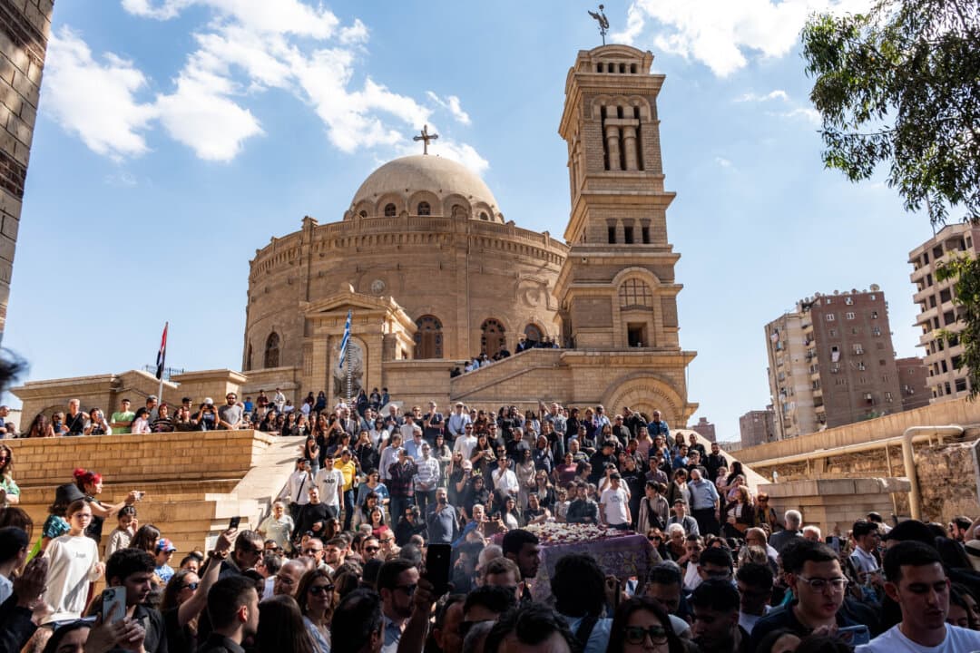 Christians take part in a procession during Good Friday at St. George Greek Orthodox Church inside the Babylon Fortress in Cairo, Egypt, on April 10, 2026. (Amir Makar/AFP via Getty Images)