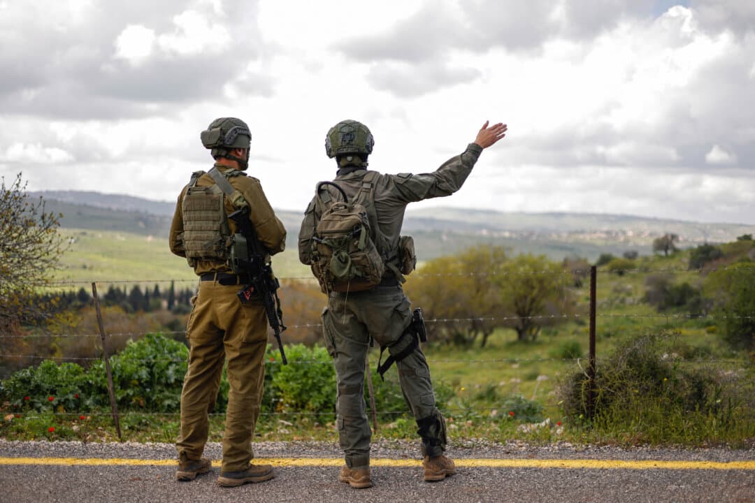 Israeli soldiers patrol along the Israel-Lebanon border on April 10, 2026. (Jalaa Marey/AFP via Getty Images)