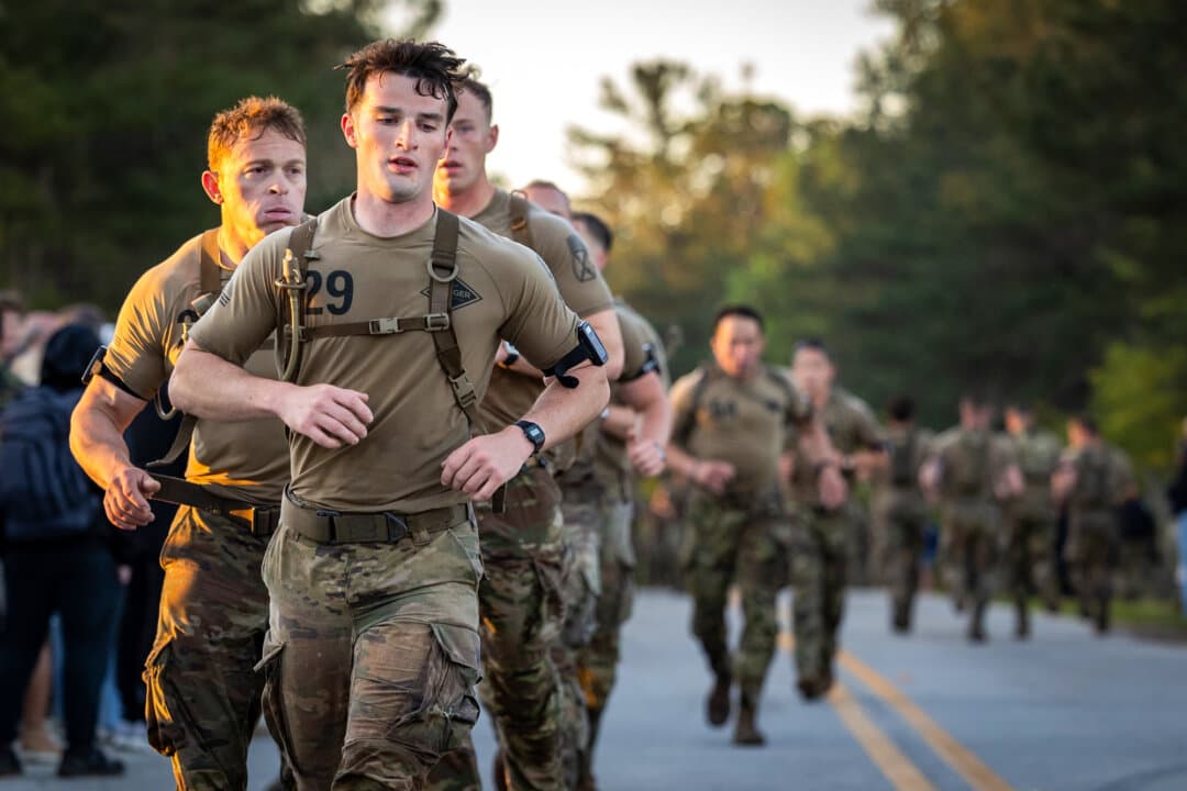 Soldiers compete in the Best Ranger Competition at Fort Benning, Ga., on April 10, 2026. Throughout the course of the three-day event, competitors traversed at least 60 miles on foot, each carrying about 80 pounds of gear, all while consuming few calories and getting little chance to sleep. (John Fredricks/The Epoch Times)