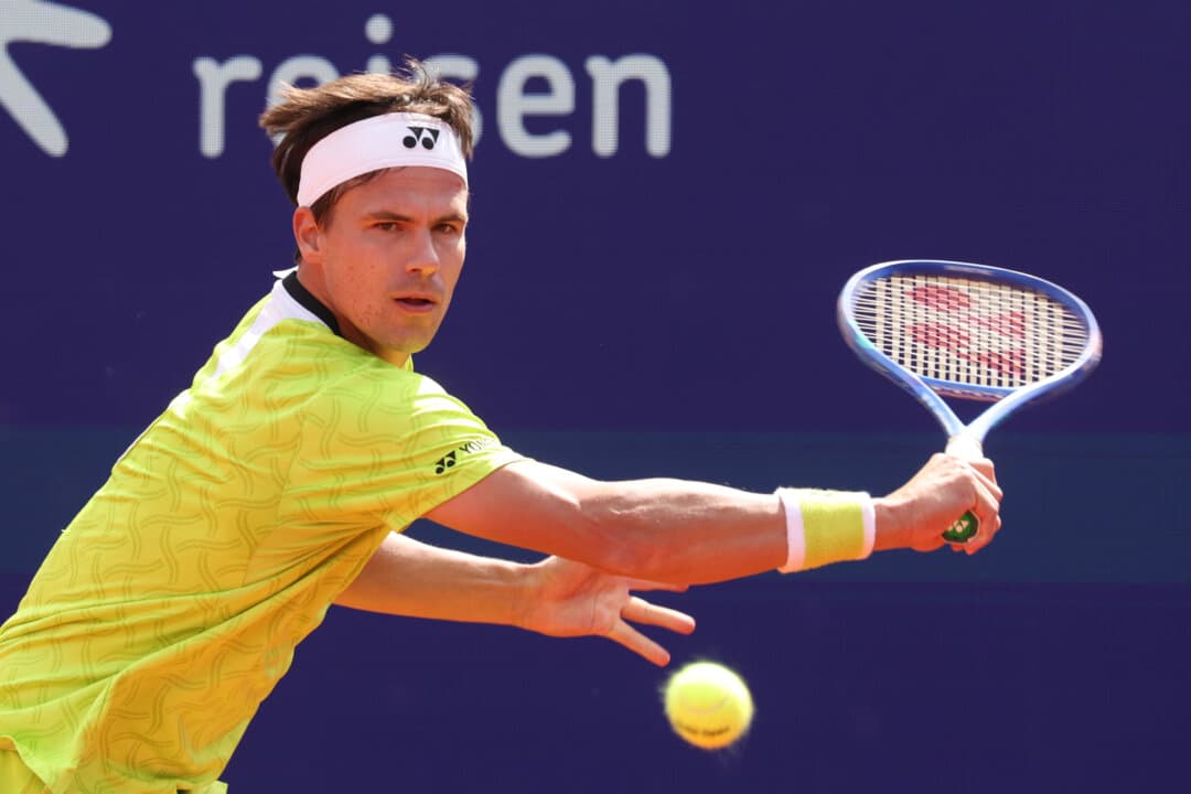 Daniel Altmaier of Germany plays a backhand against Alex Molcan of Slovakia during Day 6 of the BMW Open in Munich on April 16, 2026. (Alexander Hassenstein/Getty Images for BMW)