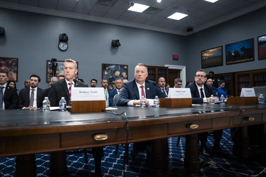 (L-R) Rodney Scott, commissioner for Customs and Border Protection; Todd Lyons, acting director for Immigration and Customs Enforcement; and Joseph Edlow, director for U.S. Citizenship and Immigration Services, testify before the House Appropriations Committee on the Trump administration's budget request on Capitol Hill on April 16, 2026. (Madalina Kilroy/The Epoch Times)