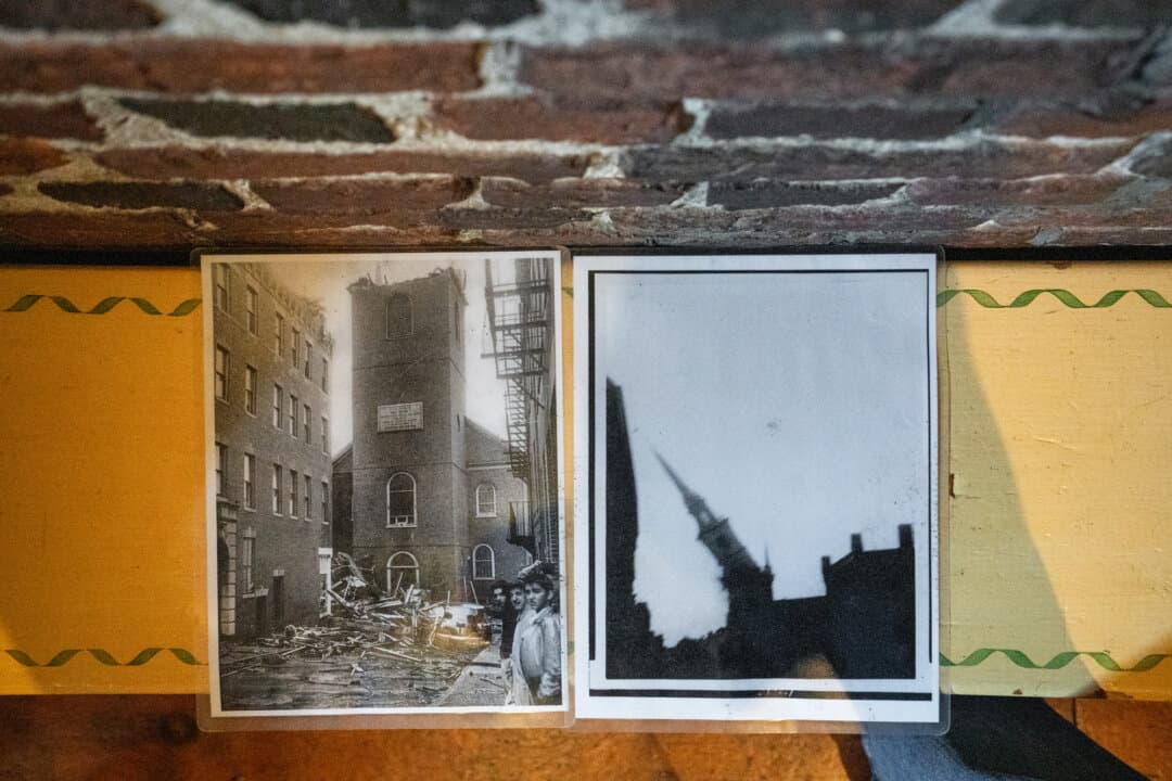 (Top Left) A replica of the 1792 contract that Paul Revere signed to serve as a bell ringer at the Old North Church is displayed in Boston on April 8, 2026. (Top Right) A bust of George Washington is displayed inside the Old North Church in Boston on April 8, 2026. (Bottom Left) Photos on display in Boston on April 8, 2026, show the church’s steeple collapse during Hurricane Carol on Aug. 31, 1954. (Bottom R) The Old North Church in Boston on April 8, 2026. (Samira Bouaou/The Epoch Times)