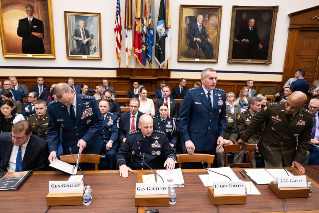 (L-R) Assistant Defense Secretary for Space Policy Marc Berkowitz, Gen. Gregory Guillot, commander of the U.S. Northern Command, and North American Aerospace Defense Command, Gen. Michael Guetlein, direct report program manager for Golden Dome for America in the Office of the Secretary of Defense, Lt. Gen. Heath Collins, director of the Missile Defense Agency, and Lt. Gen. Sean Gainey, commanding general of the U.S. Army Space and Missile Defense Command prepare and sit down before the House Armed Services Subcommittee FY27 missile defense and missile defeat programs and activities hearing on Capitol Hill in Washington on April 15, 2026. (Luke Johnson/Getty Images)