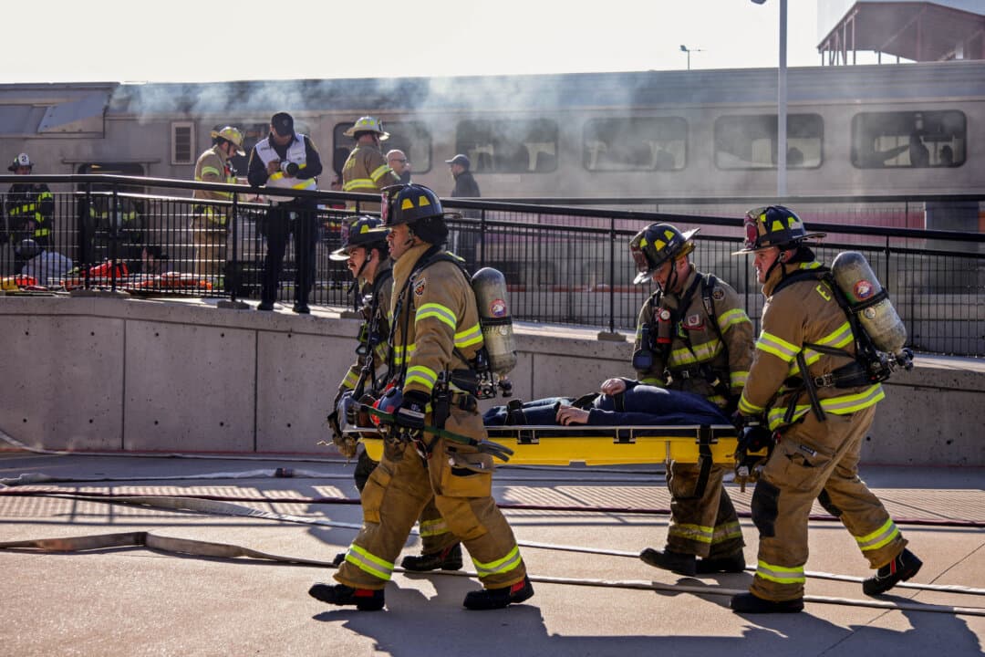 Firefighters take part in emergency response drills at the rail station near MetLife Stadium ahead of the 2026 FIFA World Cup in East Rutherford, N.J., on April 18, 2026. (Leonardo Munoz/AFP via Getty Images)
