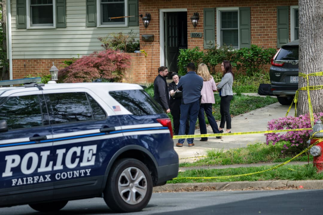Law enforcement secure a crime scene outside the home of former Virginia Lt. Gov. Justin Fairfax in Annandale, Va., on April 16, 2026. Fairfax and his wife, Cerina Fairfax, were found dead in a murder-suicide at their home. (Alex Wong/Getty Images)
