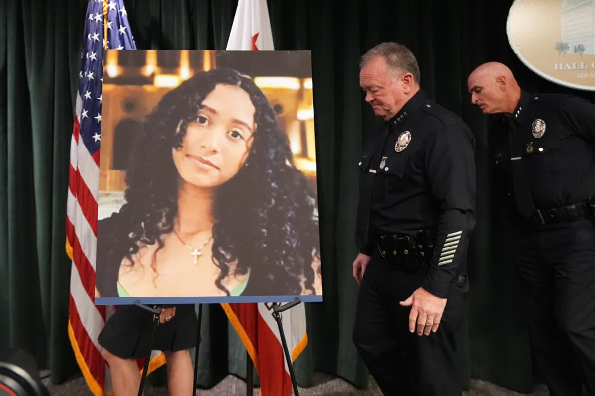 LAPD Chief Jim McDonnell walks past an image of Celeste Rivas Hernandez in Los Angeles on April 20, 2026, after a press conference regarding the case of singer D4vd, who was charged on suspicion of killing the 14-year-old girl whose dismembered body was found in his car. (Damian Dovarganes/AP Photo)