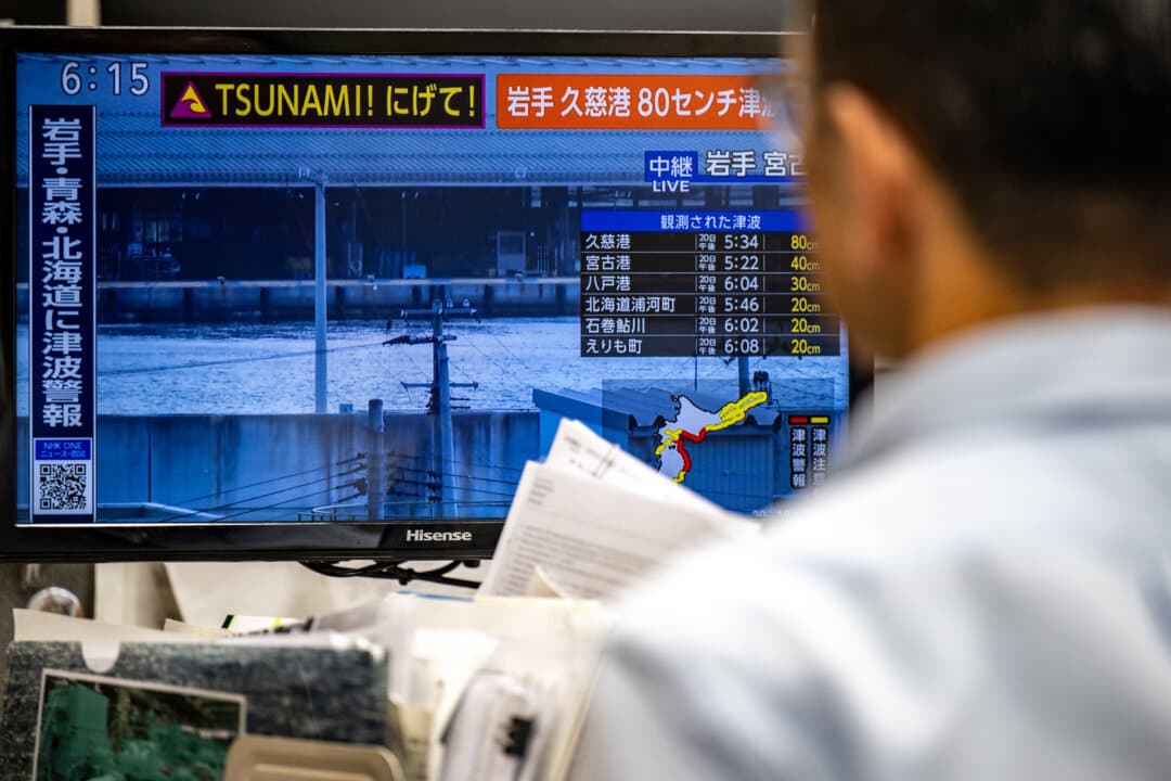 A warning message on a screen from a live feed on NHK with a tsunami alert after an earthquake hit northern Japan on April 20, 2026. A 7.4-magnitude earthquake struck northern Japan, the nation's meteorological agency said as it issued a tsunami warning for waves up to 10 feet. (Philip Fong/AFP via Getty Images)