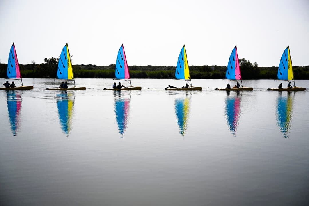 Catamaran sailboats from the Valras-Plage sailing school set sail for a lesson in France on April 21, 2026. (Gabriel Bouys/AFP via Getty Images)