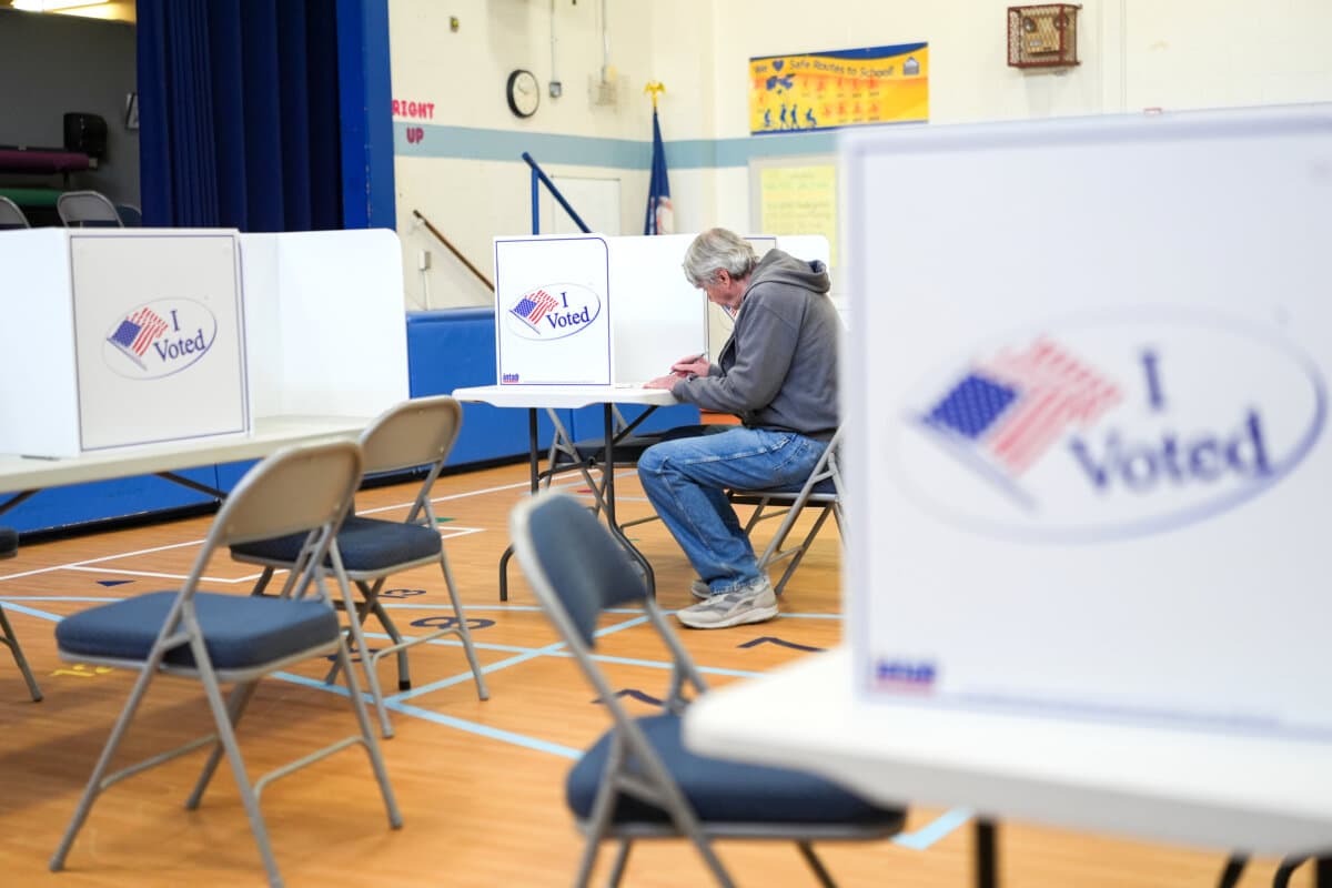 A person votes in the Virginia redistricting referendum at Lyles-Crouch Traditional Academy, in Alexandria, Va., on April 21, 2026. (Julia Demaree Nikhinson/AP Photo)