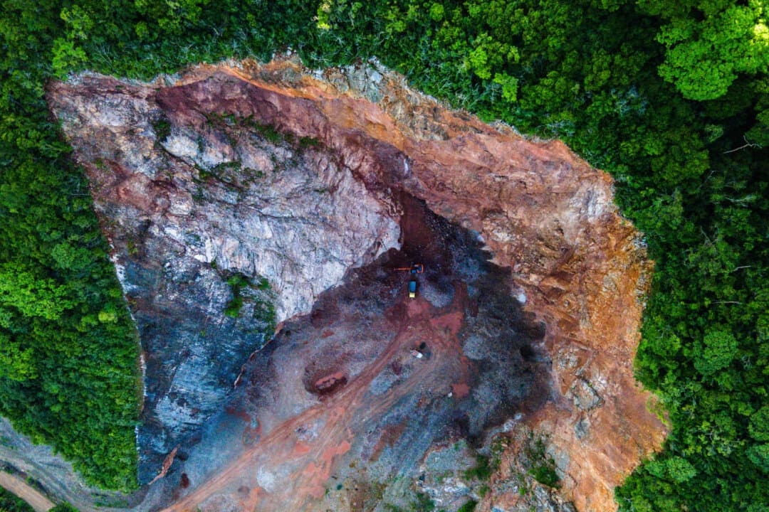 An excavator working at an illegal sand quarry on Earth Day at Peukan Bada, Indonesia, on April 22, 2026. (Chaideer Mahyuddin/AFP via Getty Images)