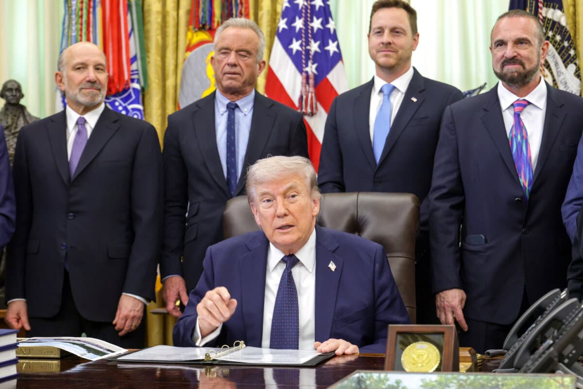 President Donald Trump (C) speaks during an event on advancing health care affordability in the Oval Office of the White House on April 23, 2026. (Alex Wong/Getty Images)
