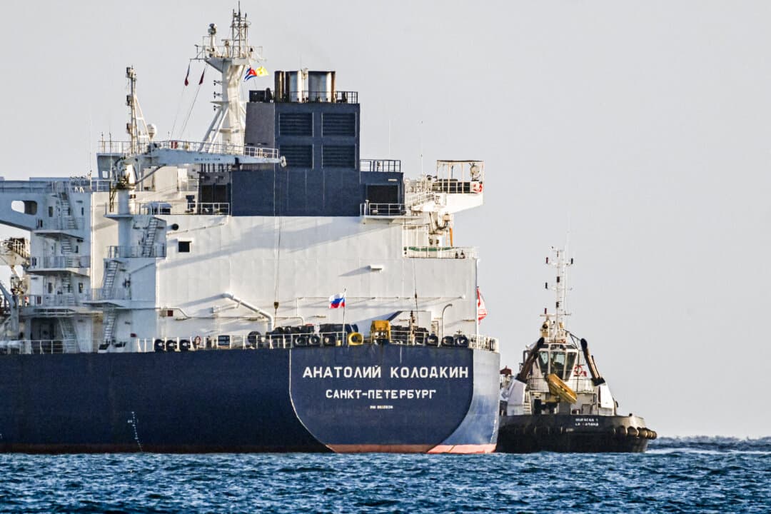 A tugboat guides a Russian oil tanker as it arrives at the oil terminal in the port of Matanzas, Cuba, on March 31, 2026. The shipment of 730,000 barrels marked Cuba’s first crude import in three months as the White House aims to push the communist-led nation into talks and concessions. (Yamil Lage/AFP via Getty Images)