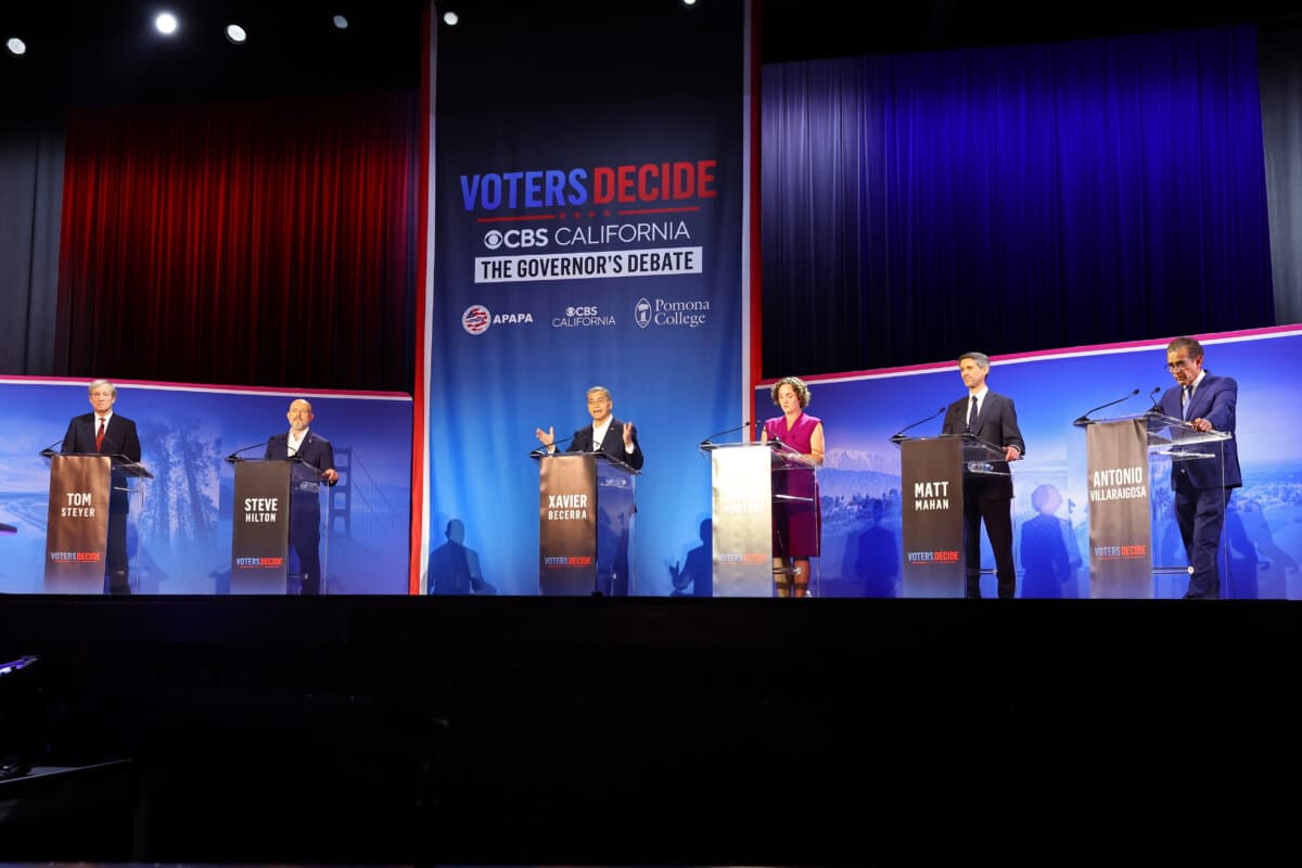 (L-R) Tom Steyer (D), Steve Hilton (R), Xavier Becerra (D), Katie Porter (D), Matt Mahan (D) and Antonio Villaraigosa (D) speak during CBS Television Stations' California Gubernatorial Debate in Claremont, Calif., on April 28, 2026. (Leon Bennett/Getty Images for CBS Television Stations)