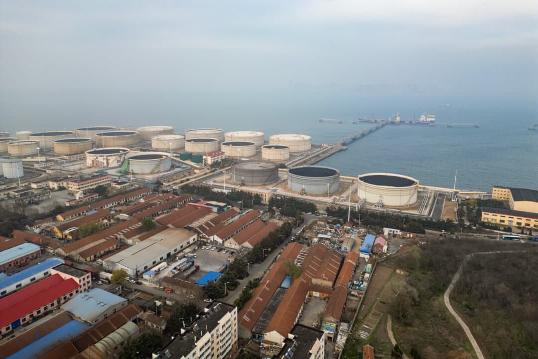 A group of oil tanks stores imported crude oil at Qingdao Port Crude Oil Terminal in Qingdao, Shandong Province, China, on April 12, 2026. For decades, Beijing has purchased most of Iran's sanctioned oil at heavy discounts. Iran has also provided China with a platform to conduct business in Chinese yuan, allowing it to bypass U.S. sanctions in the dollar system. (Staff/Getty Images)