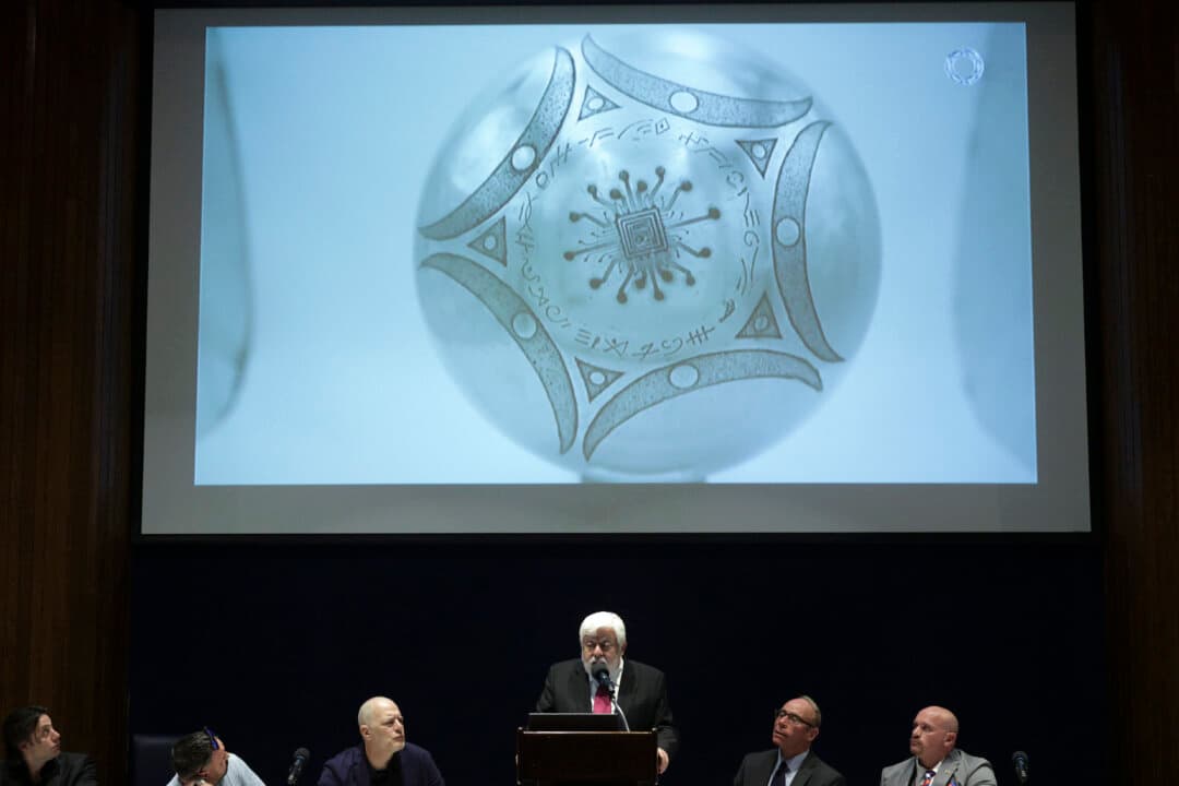 Ufologist Jaime Maussan (C) speaks during a presentation on UAP/UFO at the National Press Club in Washington on May 8, 2026. The event marks the 25th anniversary of the 2001 Disclosure Project press conference at the same venue that presented over 20 military, intelligence, and government witnesses who testified to firsthand knowledge of UAP/UFO sightings and covert government projects. (Alex Wong/Getty Images)