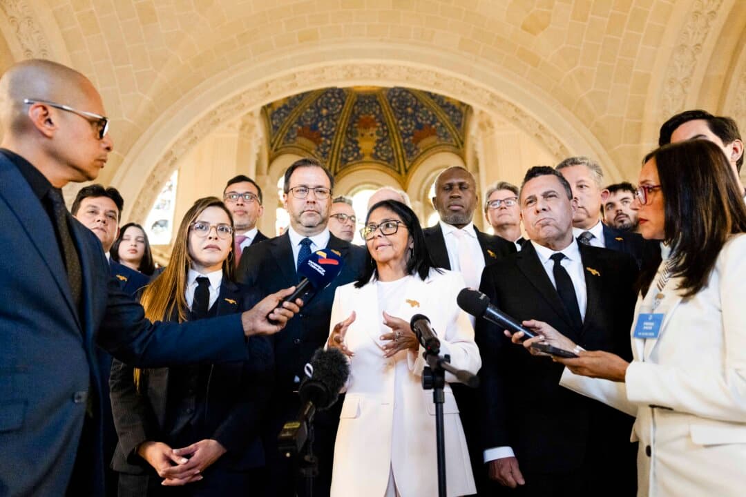 Venezuela’s acting president Delcy Rodriguez (C) speaks with journalists following a session at the International Court of Justice regarding the Essequibo region in the Hague in the Netherlands on May 11, 2026. Guyana and Venezuela have been wrangling over the region since the 1800s, with the conflict intensifying after ExxonMobil discovered massive offshore oil deposits a decade ago. (Bart Maat/ANP/AFP via Getty Images)