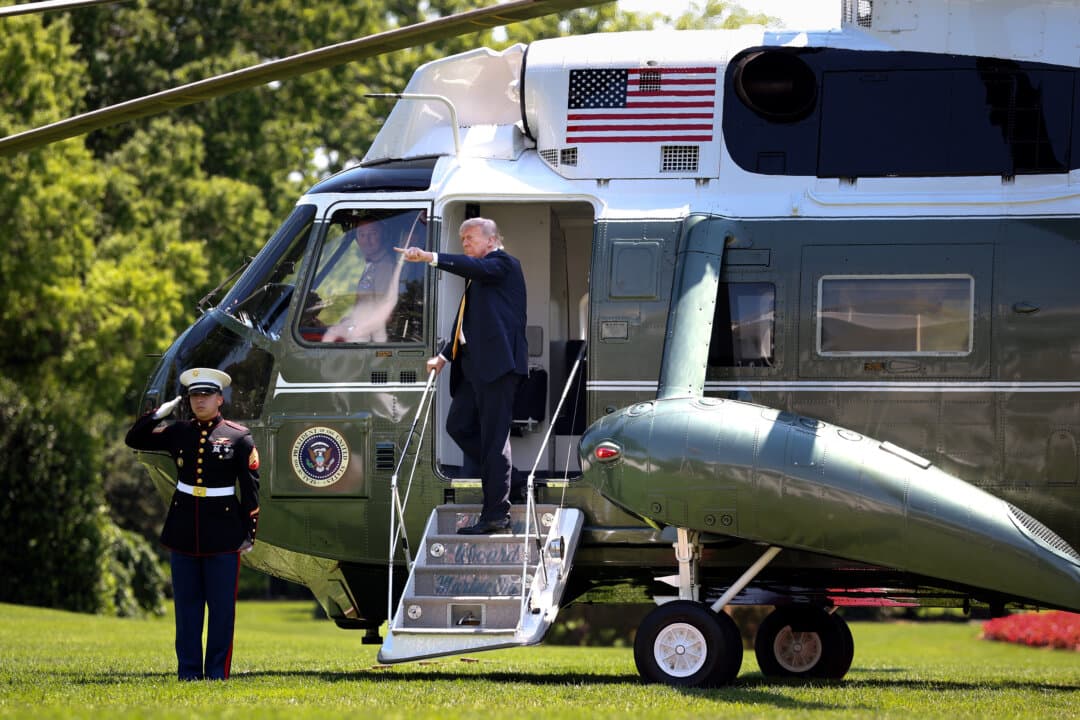 President Donald Trump boards Marine One as he departs the White House on May 12, 2026. Trump is traveling to China to meet with Chinese leader Xi Jinping for talks on the Iran conflict, trade imbalances, and regional security. (Kevin Dietsch/Getty Images)