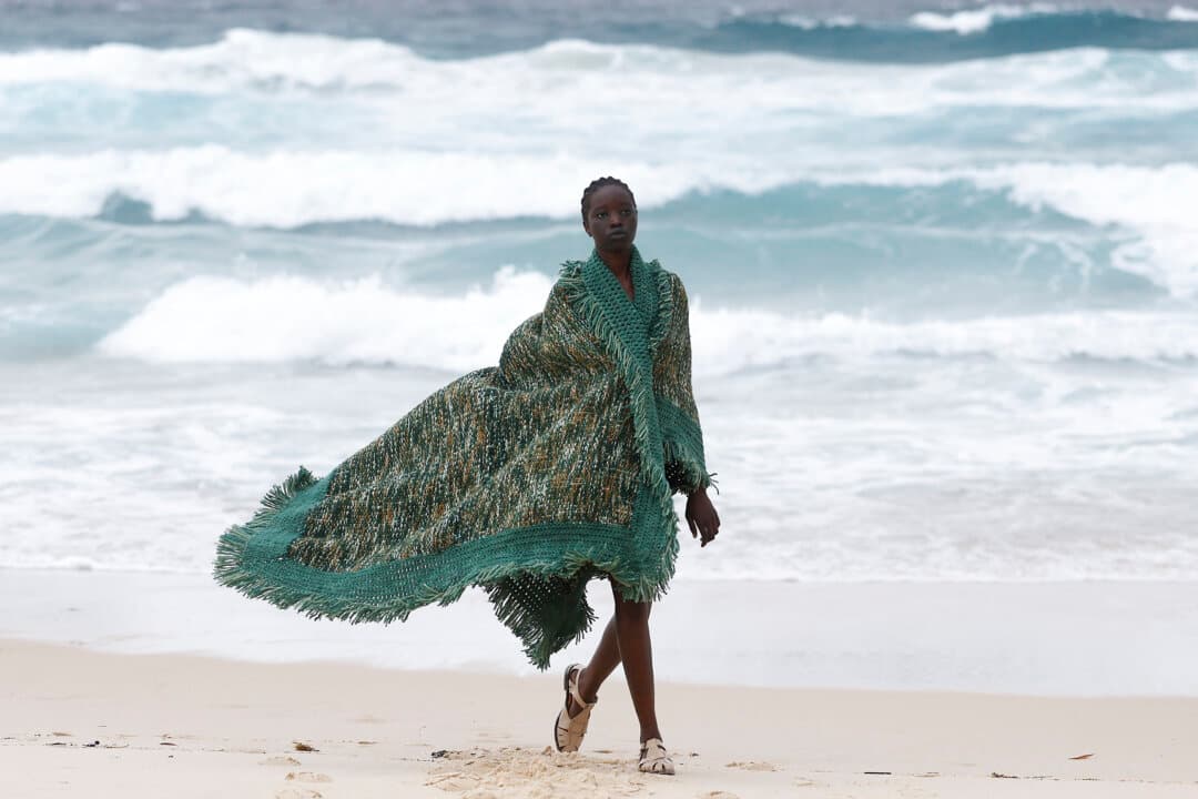 A model walks the runway during the COMMAS show at Australian Fashion Week 2026 at Tamarama Beach in Sydney on May 12, 2026. (Brendon Thorne/Getty Images)