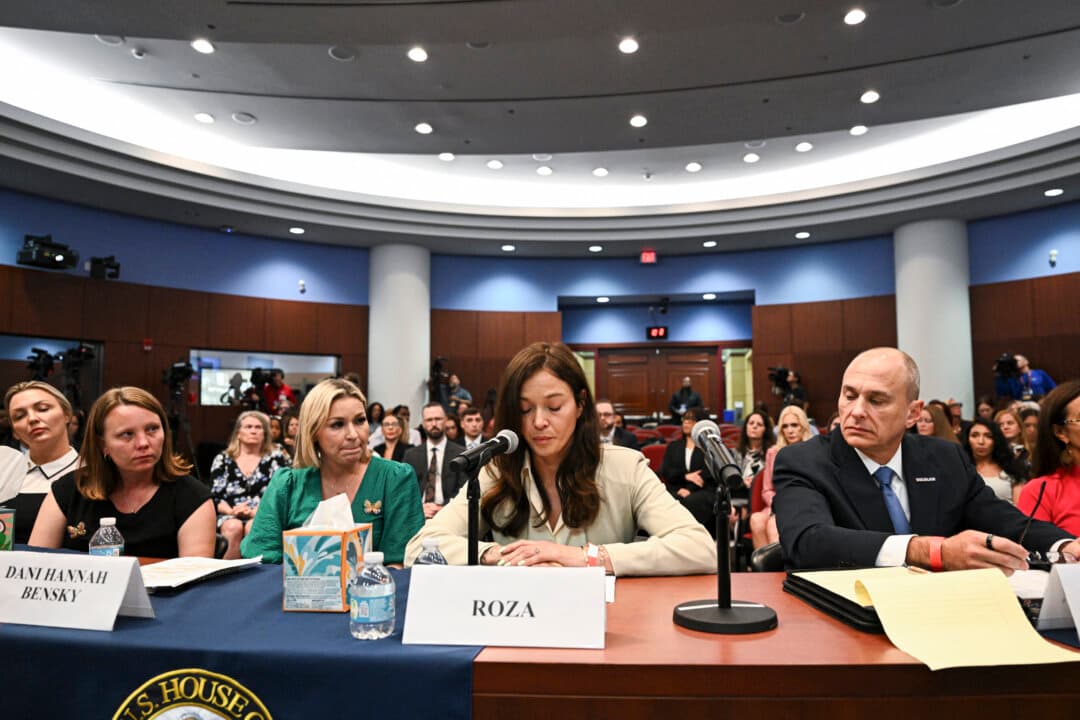 Jeffrey Epstein survivor Roza (C) speaks during a Democrat-led House Oversight field hearing on the Epstein investigation in West Palm Beach, Fla., on May 12, 2026. (Chandan Khanna / AFP via Getty Images)