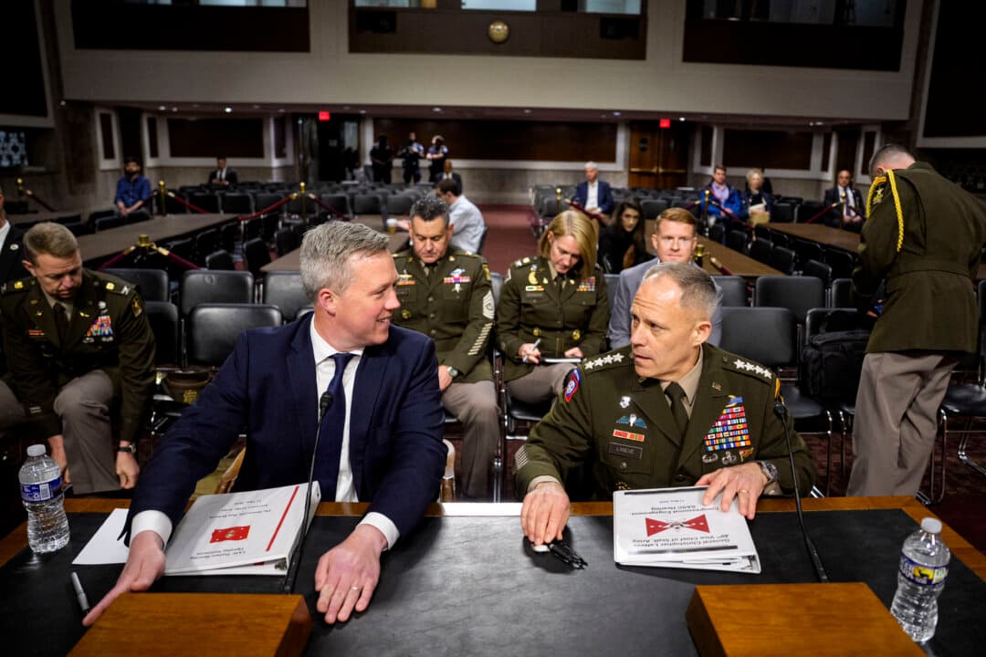 U.S. Army Secretary Dan Driscoll (L) and Army Vice Chief of Staff Gen. Christopher LaNeve (R) arrive for a Senate Armed Services Committee hearing on Capitol Hill on May 12, 2026. The committee held a hearing to review the Defense Authorization Request for Fiscal Year 2027 and the Future Years Defense Program. (Andrew Harnik/Getty Images)