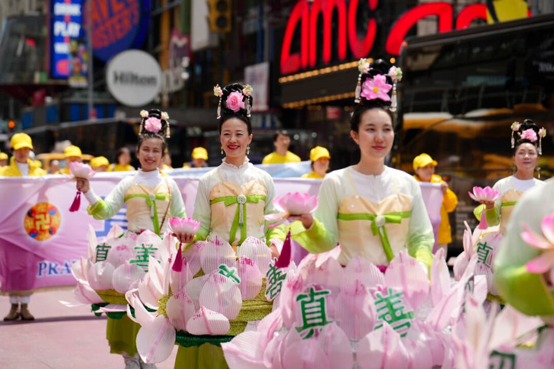 Falun Gong practitioners take part in a parade to celebrate World Falun Dafa Day and call for an end to persecution in China, in New York City, on May 13, 2026. (Samira Bouaou/The Epoch Times)
