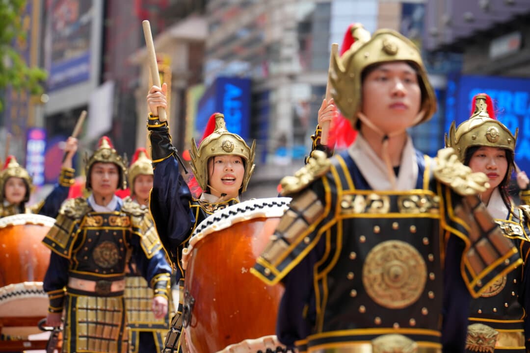 Falun Gong practitioners take part in a parade to celebrate World Falun Dafa Day and call for an end to persecution in China, in New York City, on May 13, 2026. (Samira Bouaou/The Epoch Times)