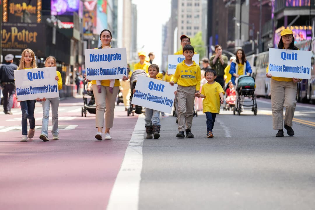 Falun Gong practitioners take part in a parade to celebrate World Falun Dafa Day and call for an end to persecution in China, in New York City, on May 13, 2026. (Samira Bouaou/The Epoch Times)