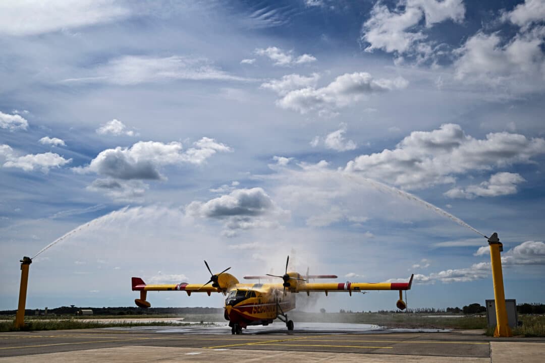 A Canadair water-bomber aircraft is cleaned to prevent corrosion from salt water at the Nimes-Garons firefighters air base in Garons, France, on May 13, 2026. (Gabriel Bouys/AFP via Getty Images)
