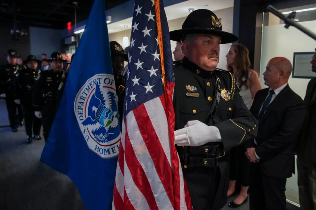 Officers with Immigration and Customs Enforcement hold the colors during an event for National Police Week at the U.S. Immigration and Customs Enforcement (ICE) headquarters in Washington on May 13, 2026. National Police Week celebrates law enforcement officers and honors those who have fallen in the line of duty. (Andrew Harnik/Getty Images)