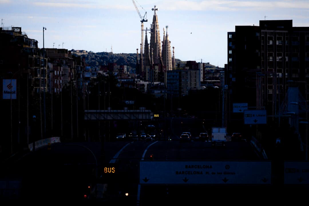The Sagrada Familia Basilica stands at the end of Meridiana Avenue during sunset in Barcelona on May 14, 2026. (Josep Lago/AFP via Getty Images)