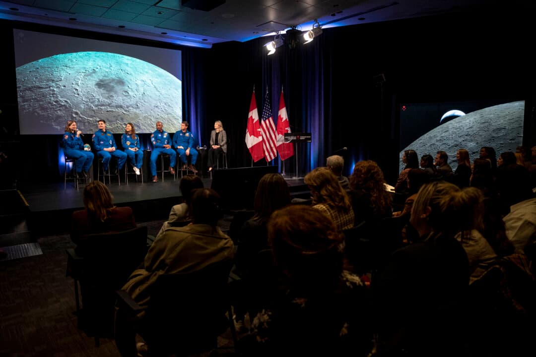 (L-R) Artemis II crew members backup engineer Jenni Gibbons, mission specialist Jeremy Hansen, mission specialist Christina Koch, pilot Victor Glover, commander Reid Wiseman, and Canadian Minister of Industry Melanie Joly speak at the Canadian Space Agency (CSA) headquarters in Longueuil, Quebec, on May 14, 2026. (Andrej Ivanov/AFP via Getty Images)