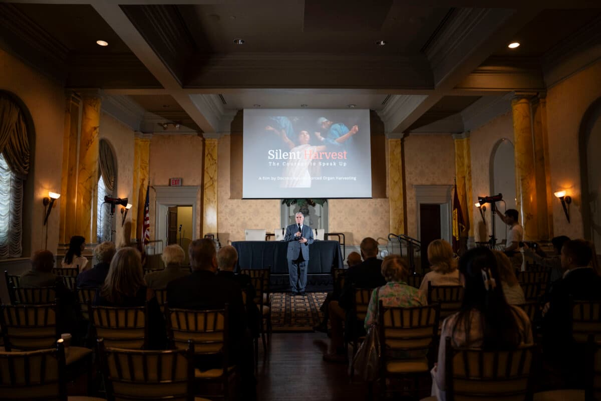 Torsten Trey founder and executive director of Doctors Against Forced Organ Harvesting speaks during the screening of the documentary “Silent Harvest: The Courage to Speak Up,” in Washington on May 16, 2026. (Madalina Kilroy/The Epoch Times)