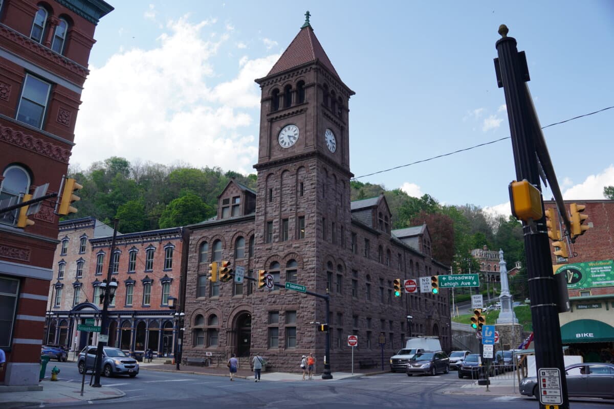 Residents walk down Broadway, the main thoroughfare in the mountain city of Jim Thorpe, in Pennsylvania's 7th Congressional District on May 18, 2026. (Jacob Burg/The Epoch Times)