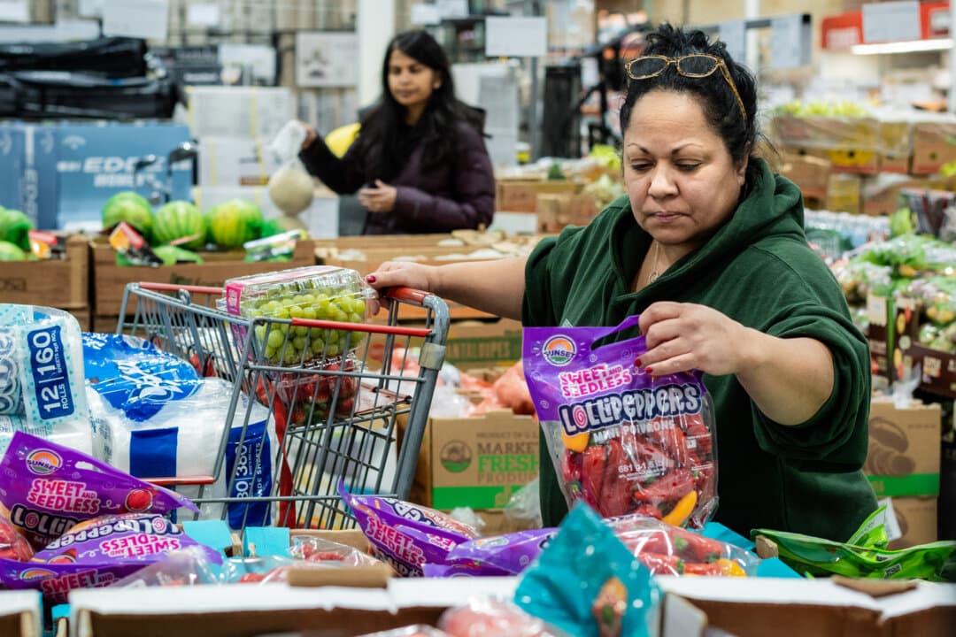 People shop for groceries at a store in Mount Laurel, N.J., on Feb. 5, 2025. Engelhart said cheap, overprocessed food in grocery stores is one reason many farmers are going out of business. (Samira Bouaou/The Epoch Times)
