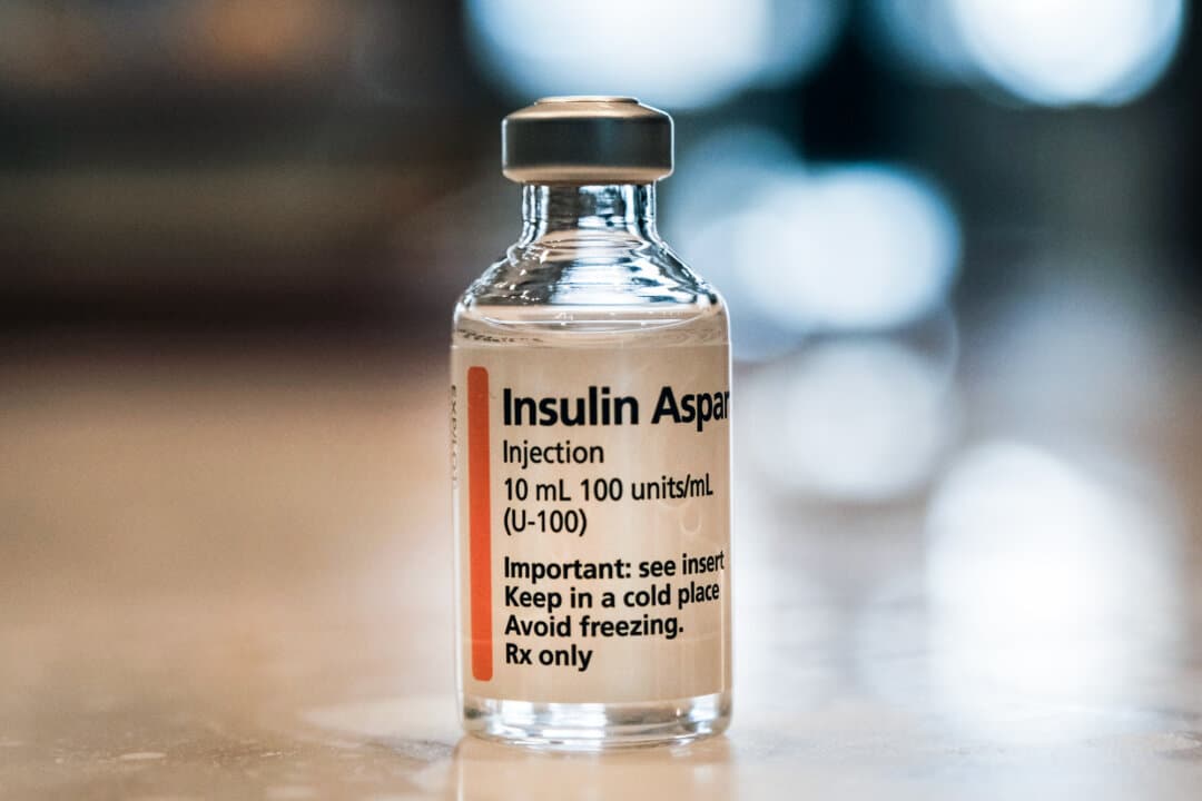 An insulin vial is shown in New York City on March 2, 2023. Patent strategies kept insulin prices high for decades, according to the Colorado attorney general. (Illustration by Spencer Platt/Getty Images)